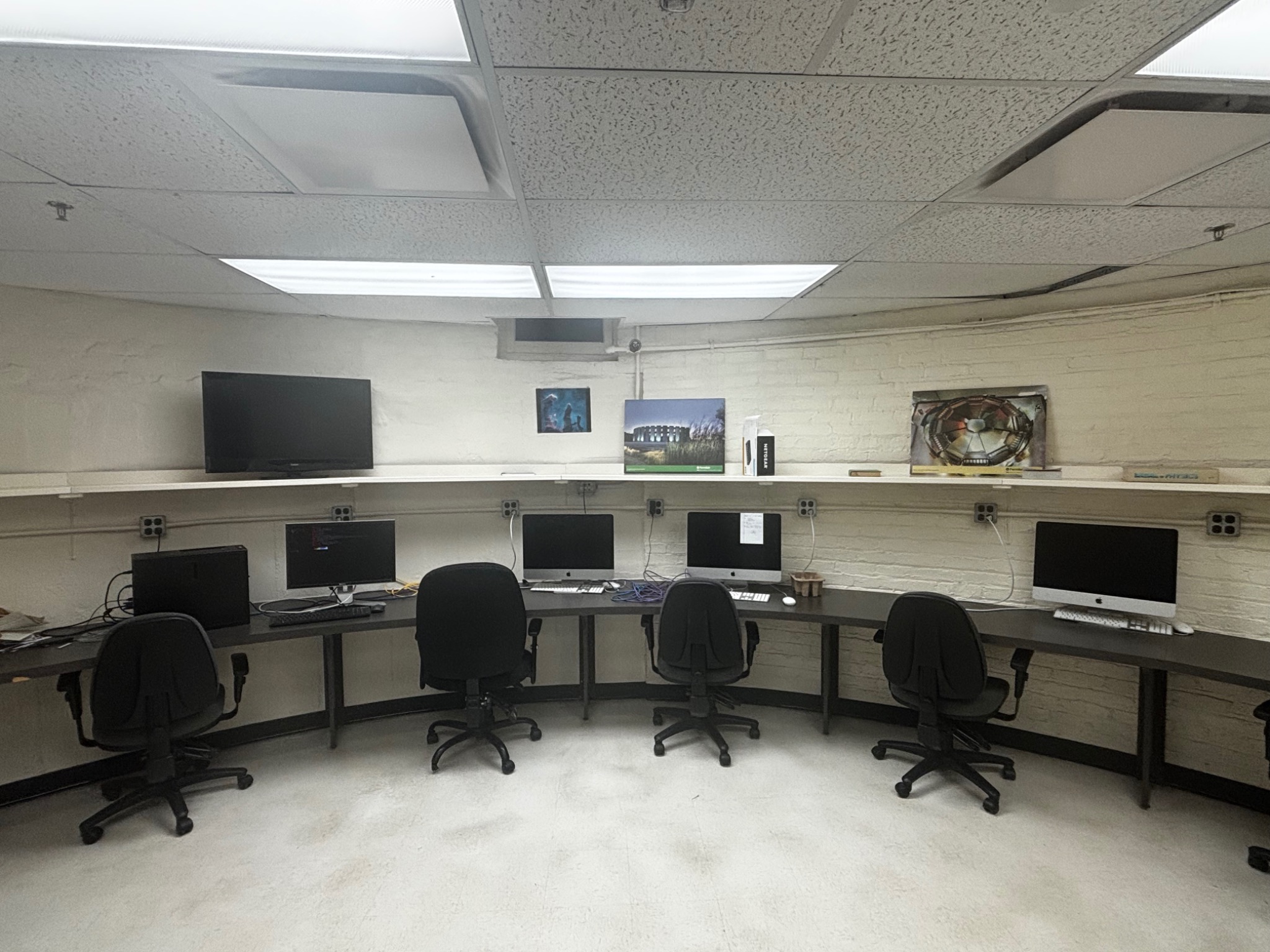 Observatory workstation area with repurposed iMacs and local computing equipment